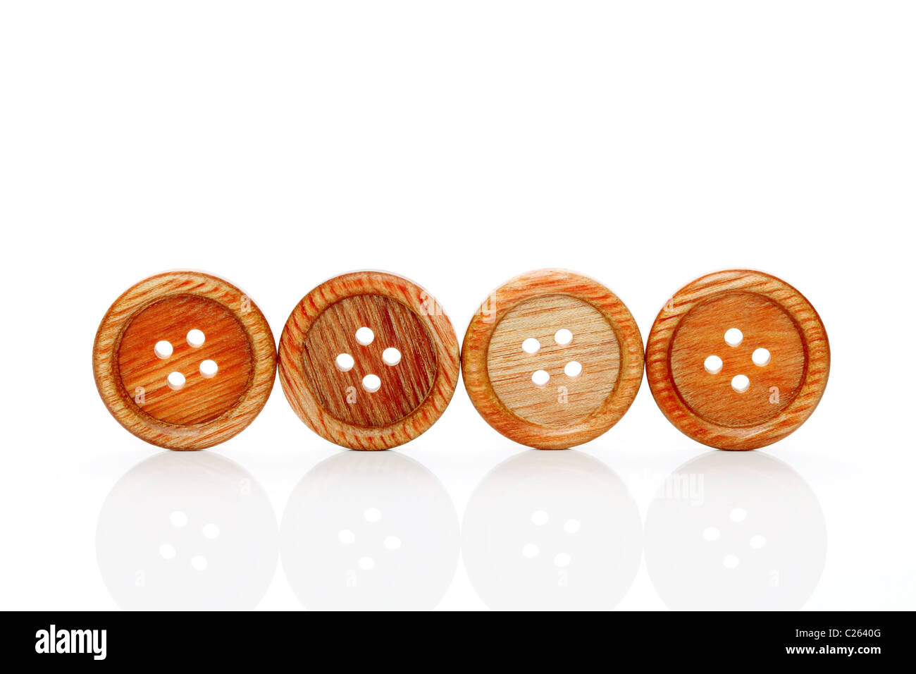 Wooden buttons isolated on white background Stock Photo - Alamy