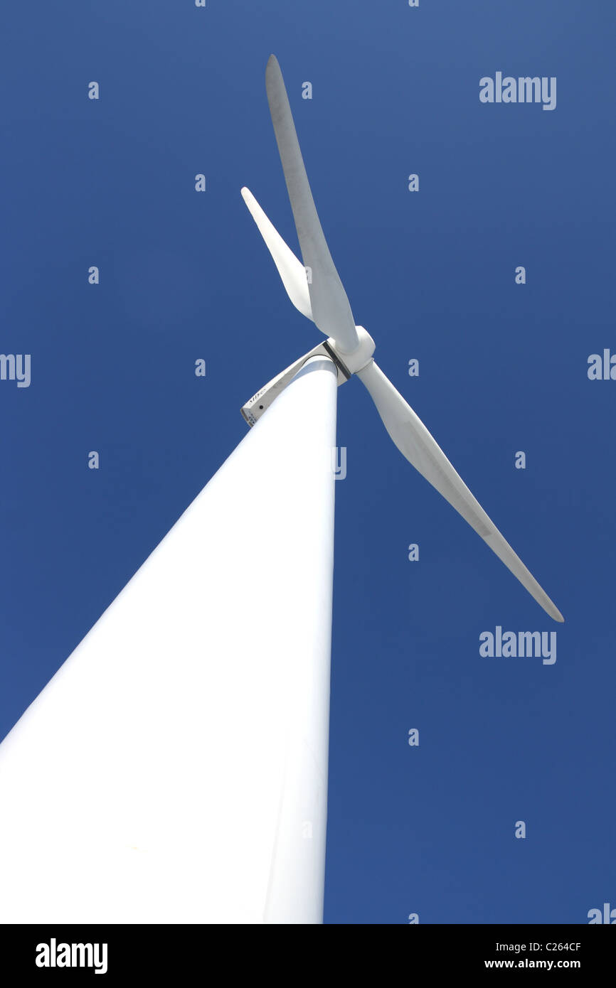View of single windmill generating electricity against blue sky Stock ...