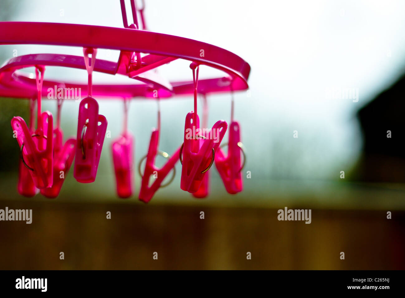 Clothes pegs on a washing line Stock Photo - Alamy