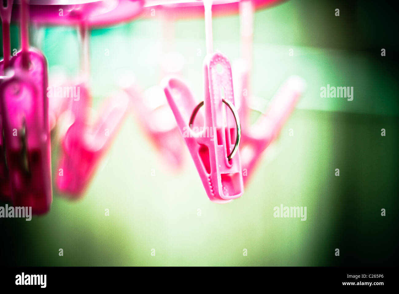 Clothes pegs on a washing line Stock Photo - Alamy
