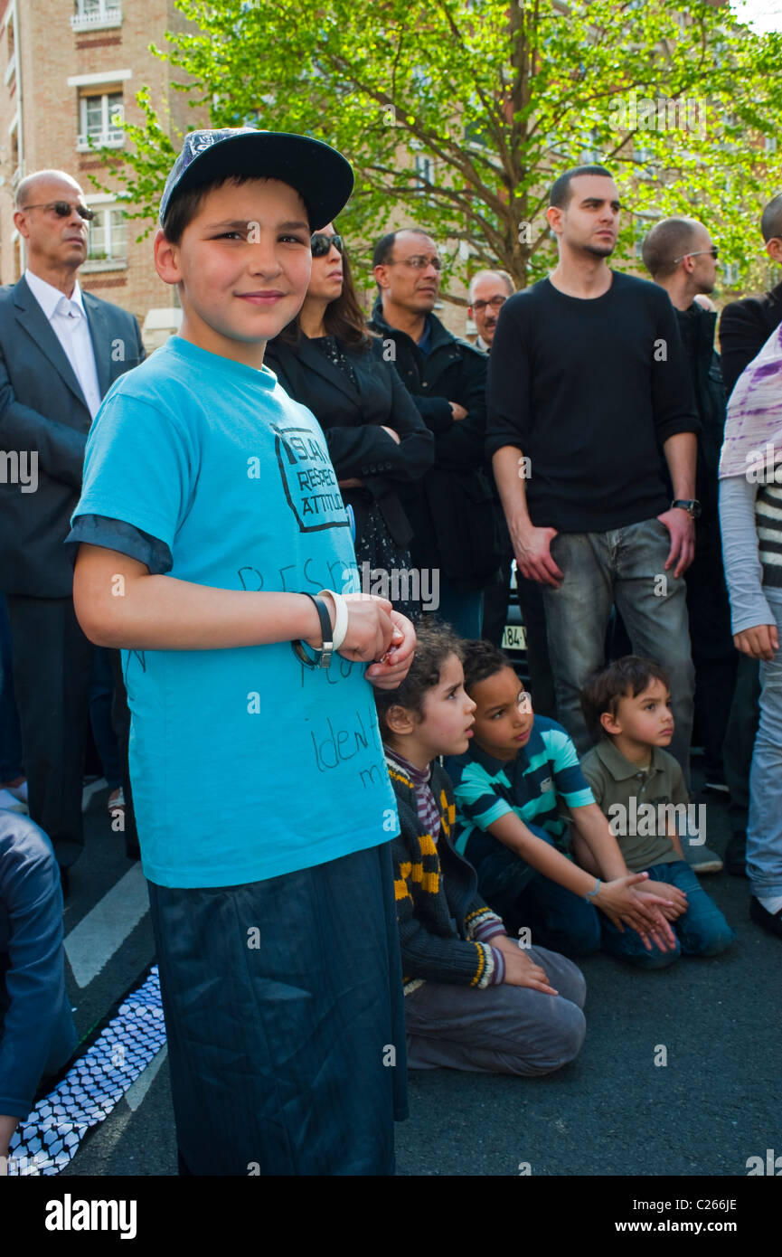 Paris, France, Crowd of Muslim Men, Demonstrating Against Islamophobia, 'Mosquee de Paris', Teenager Boy Standing on Street Stock Photo