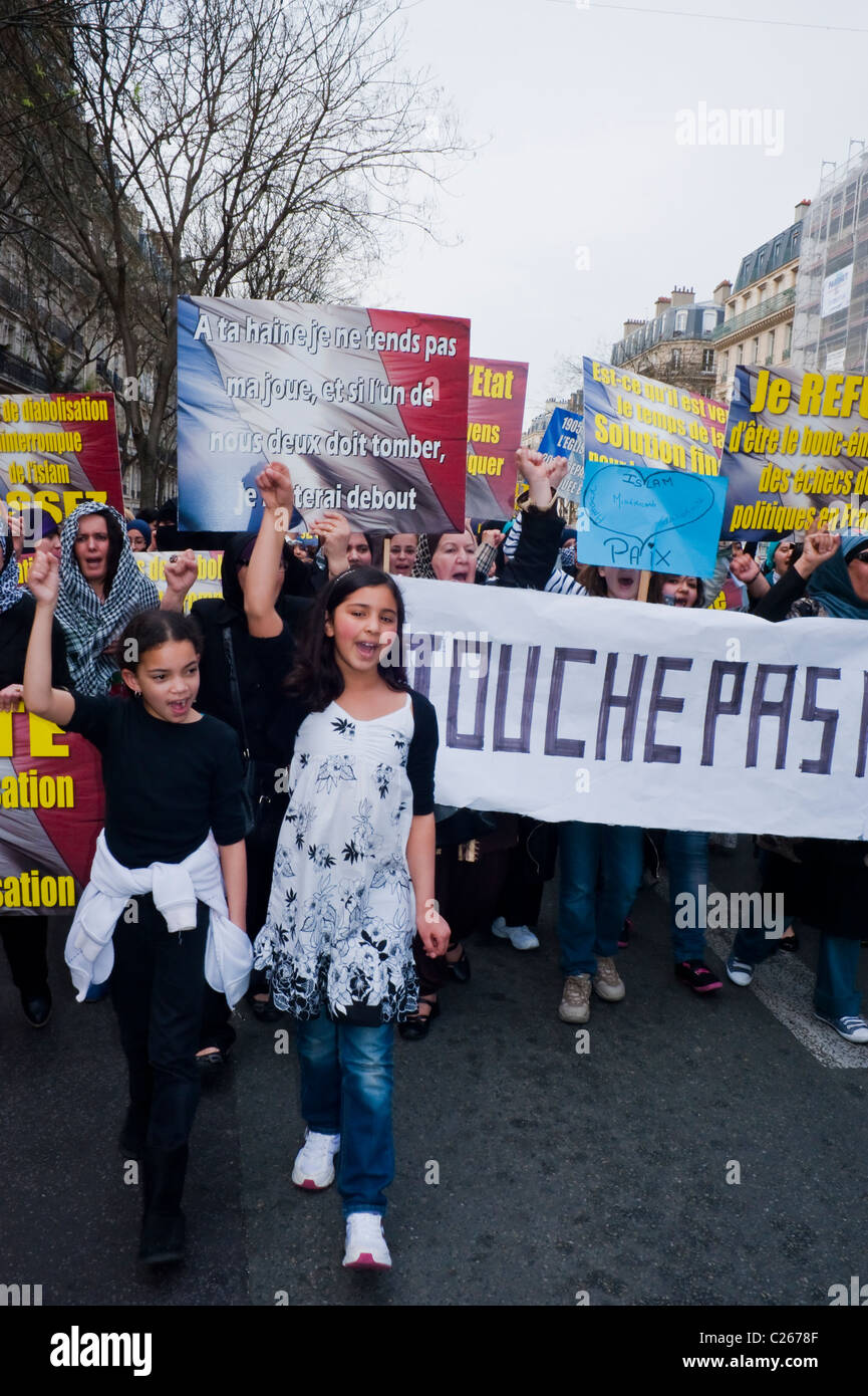 Paris, France, Muslim Women and Children Demonstrating Against Islamophobia, Anti-Islamic Religious Discrimination, Marching with Protest Signs and banners Stock Photo