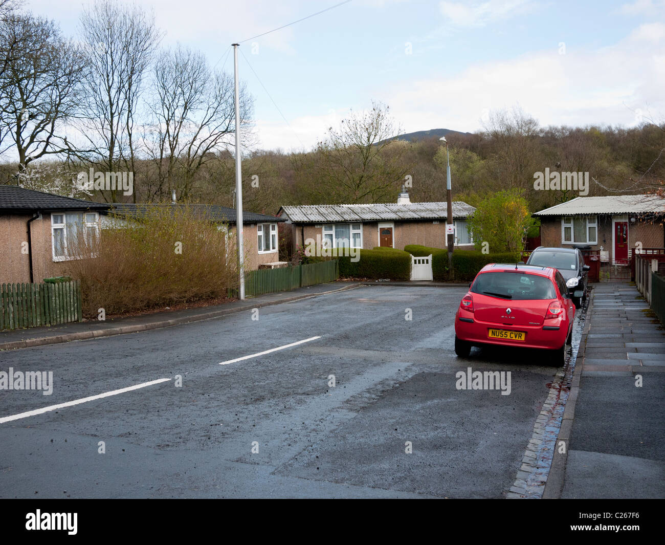 Street with prefabricated houses, Mossley, Lancashire, England, UK. Stock Photo