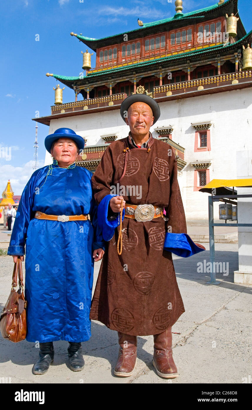 Mongolian couple visiting a temple in Ulaan Baatar, Mongolia Stock Photo