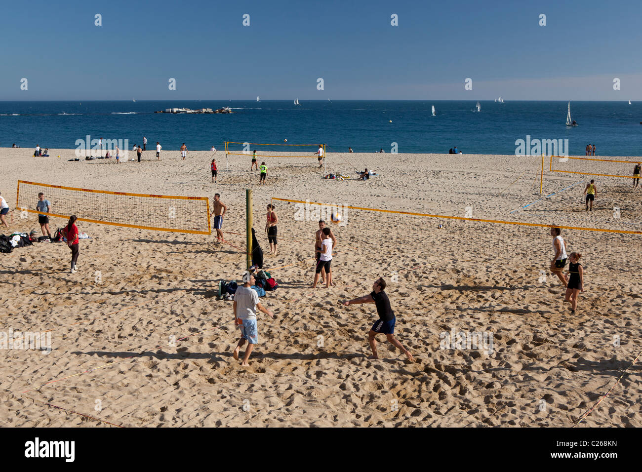 Playing volleyball in Bogatell beach, Barcelona, Spain Stock Photo Alamy