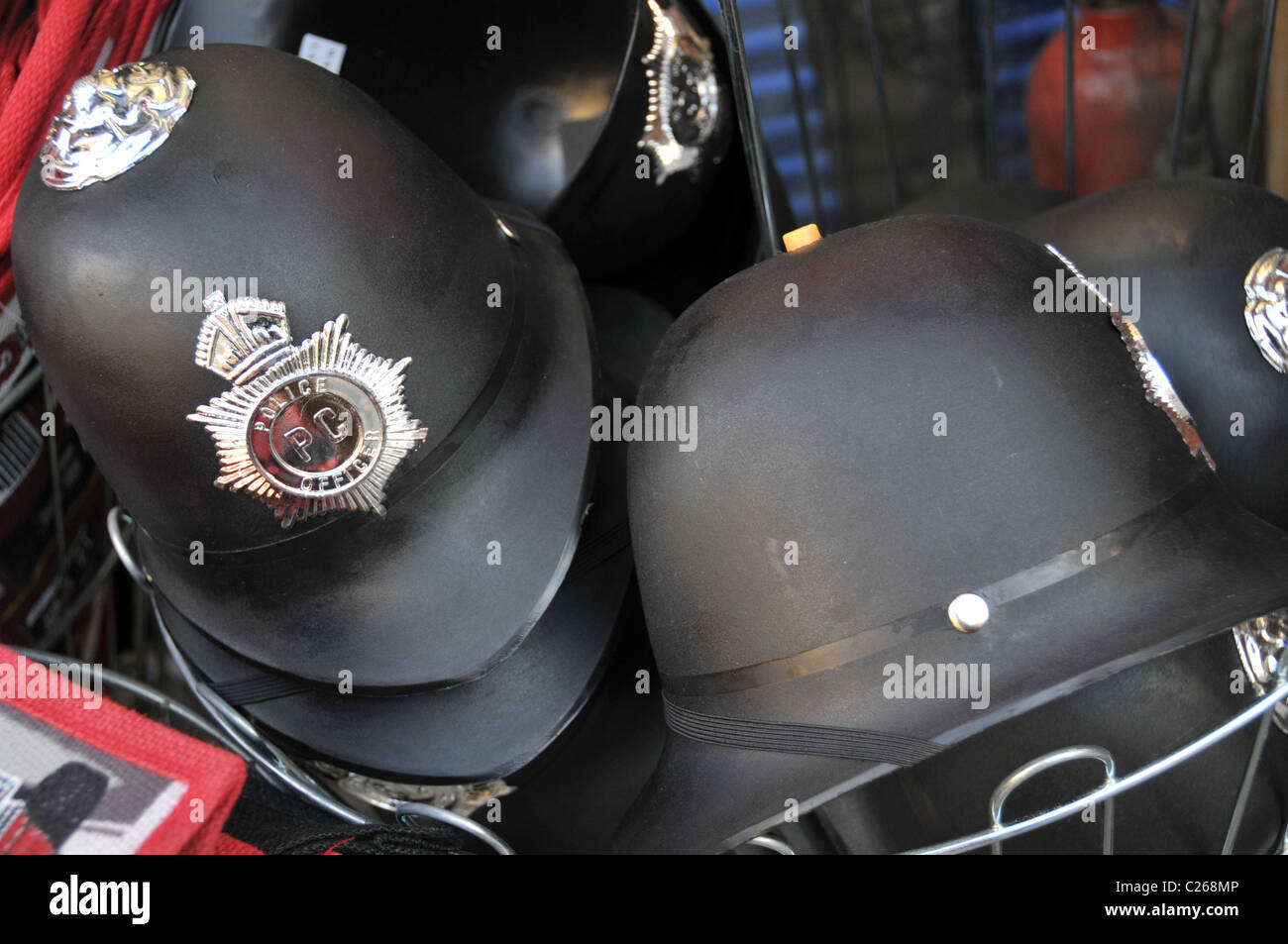 Plastic policeman helmets bobbies joke tourist gifts tourism London Stock Photo