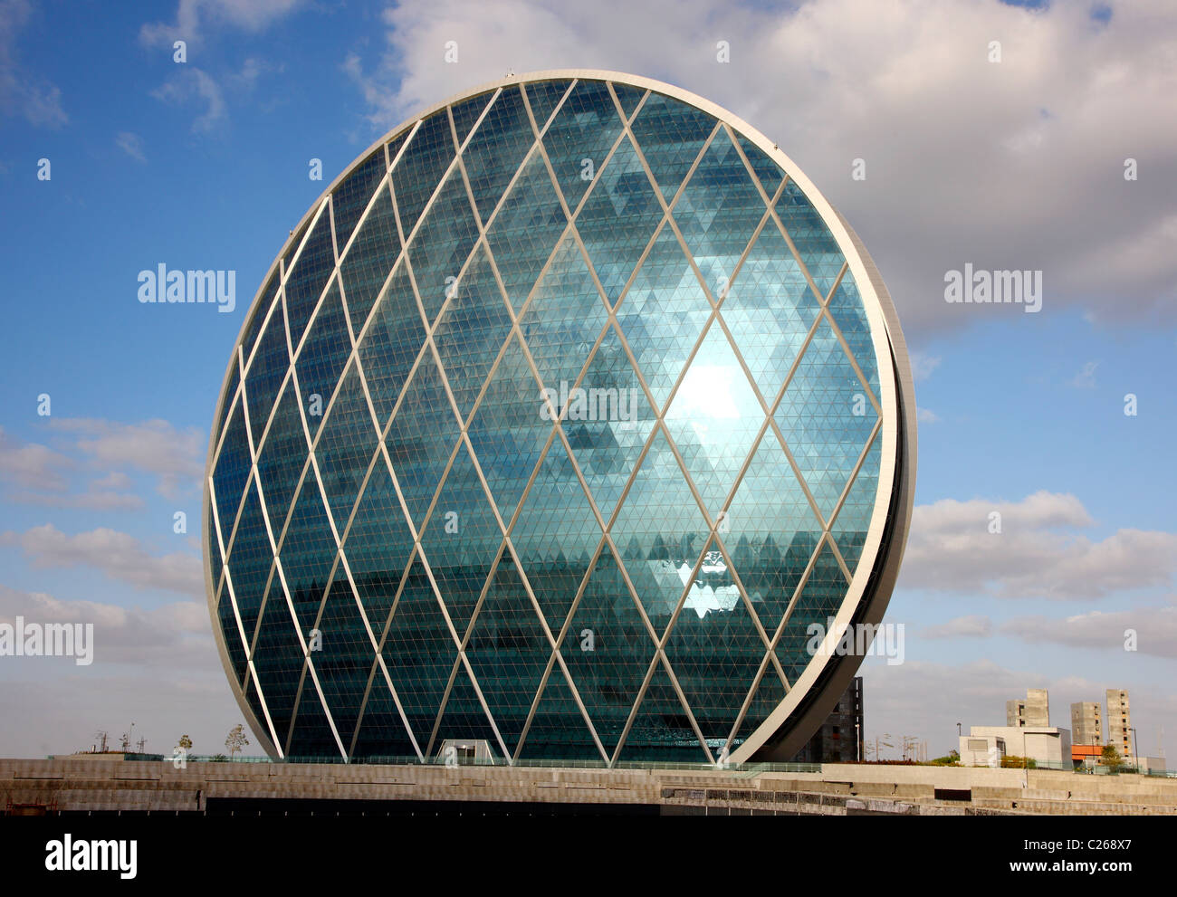 Headquarter of real estate company ALDAR, in a round shape. Called 'The Coin'. Abu Dhabi, United Arab Emirates. Stock Photo