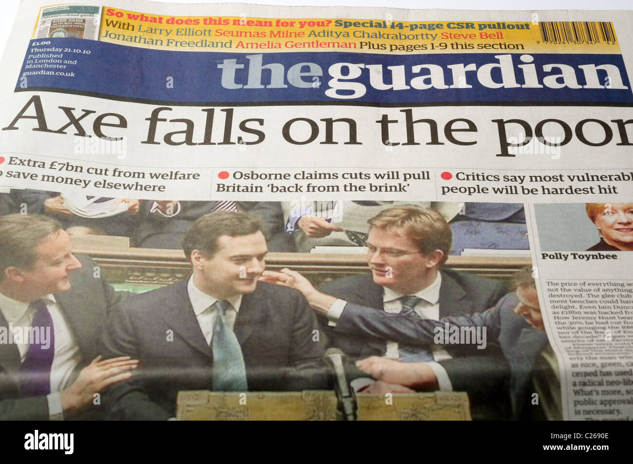 The Guardian newspaper with headline 'Axe falls on the poor' Stock Photo
