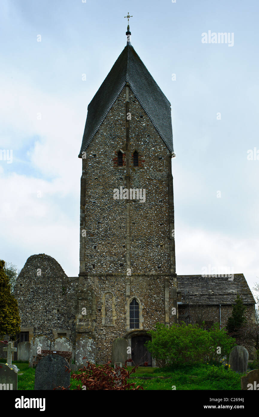 St. Mary's Church, Sompting in the South Downs. It features the only example of four-sided gabled spire Saxon Tower Stock Photo