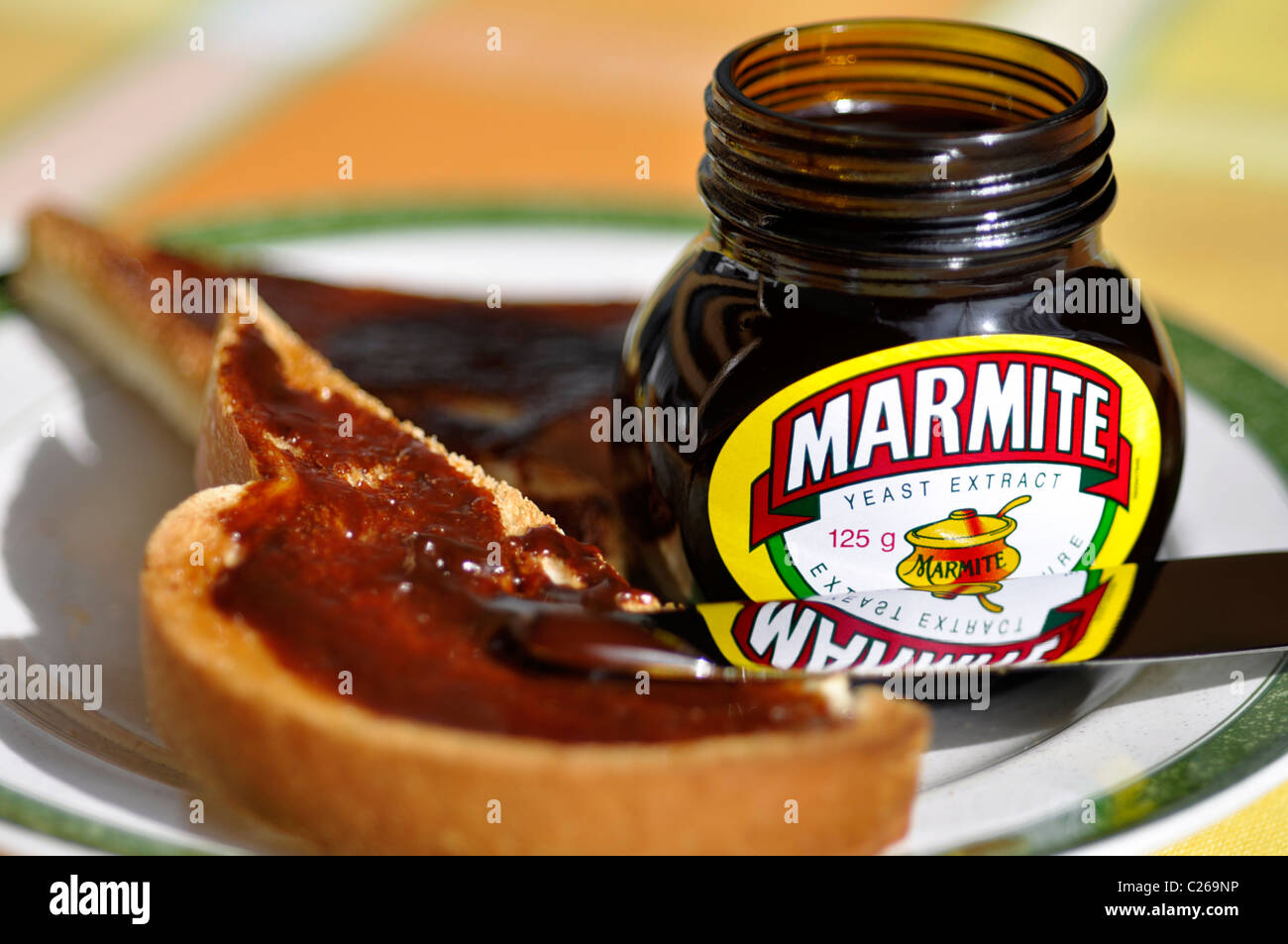Marmite open jar and Toast Stock Photo