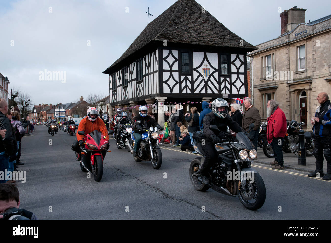 Motorcyclists taking part in the Ride of Respect to raise funds for the Afghan Heroes ride through Wootton Bassett Stock Photo