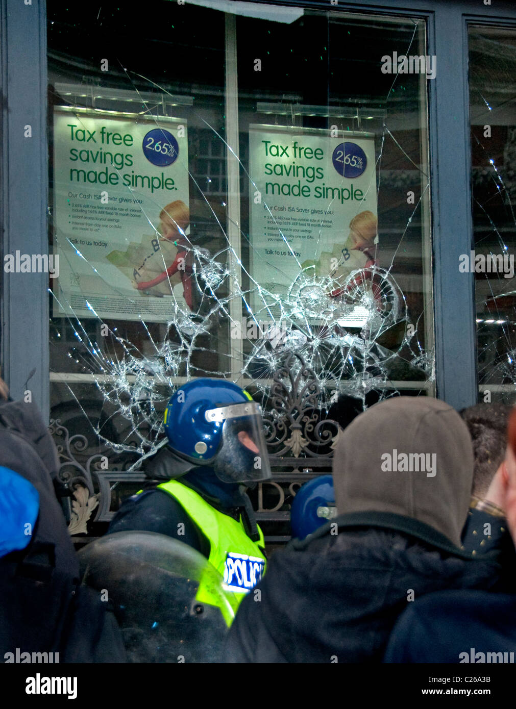 Bank windows broken at protest against government cuts  'March for the Alternative' march 2011 Stock Photo