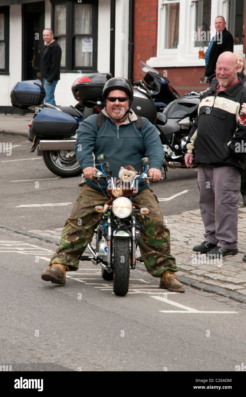 fat man on monkey bike