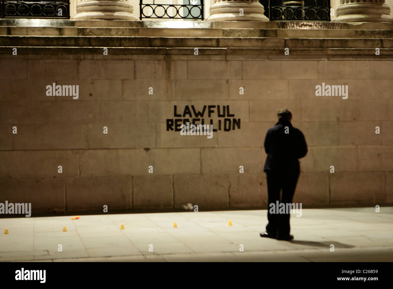 Lawful Rebellion graffiti on the wall of a building in Trafalgar Square Stock Photo