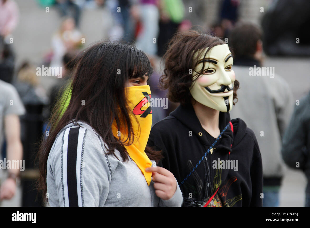 Masked protesters at occupation of Trafalgar Square London Stock Photo