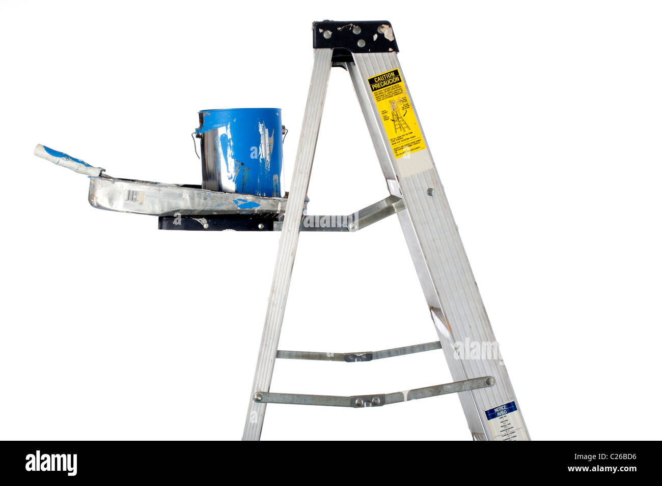 Horizontal image of a paint can, paint roller and tray on a ladder on white Stock Photo