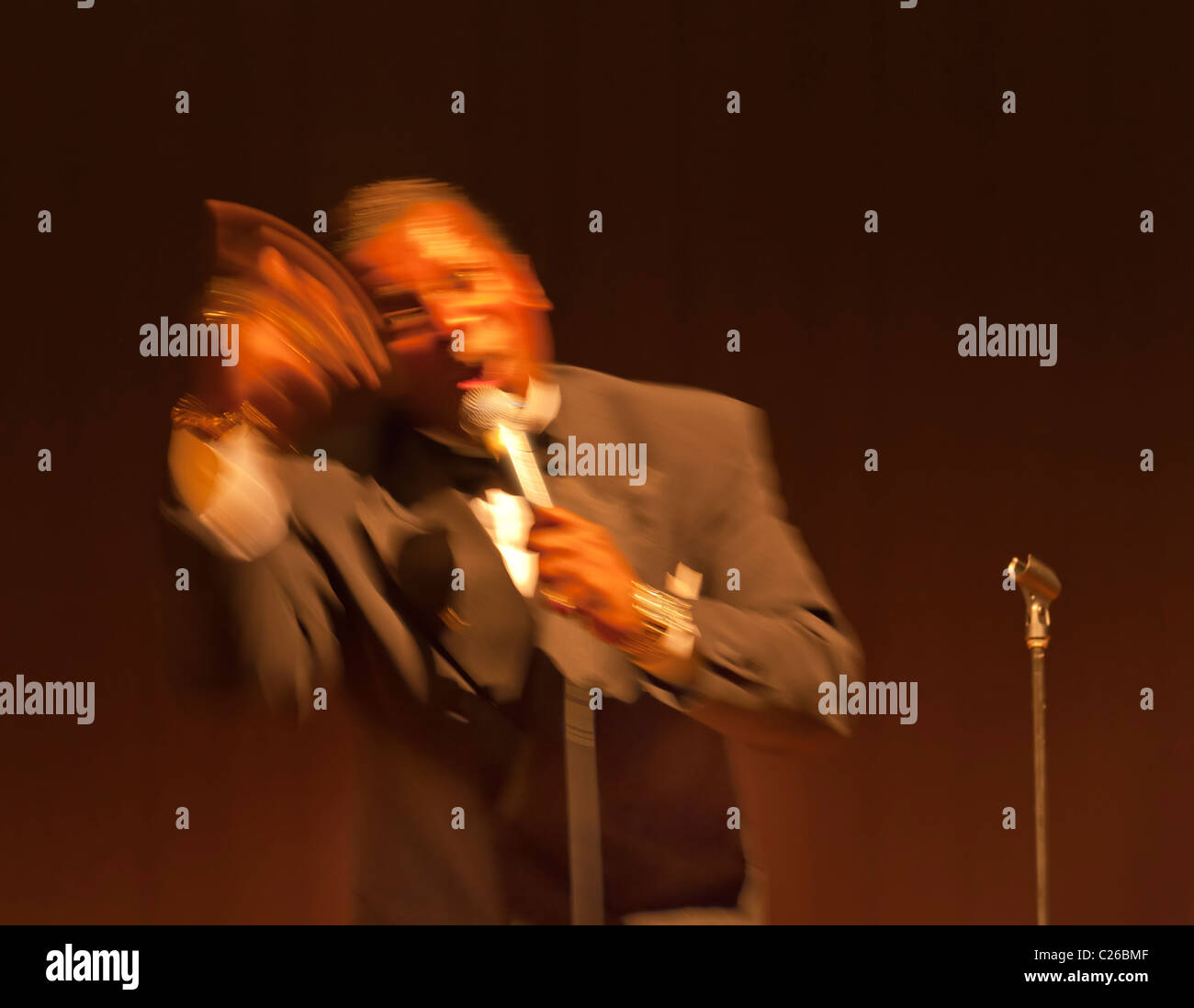 APRIL 2, 2011 - BELLMORE NY: Doo Wop concert lead singer closeup The Original Cornell Gunters Coasters oldies music, motion blur Stock Photo
