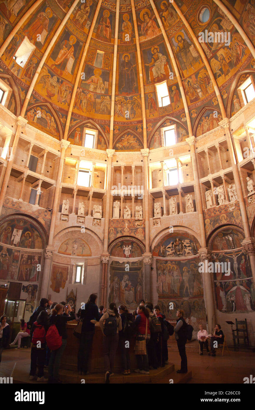 Frescoes line the wall of the Baptistry in Parma Italy. Stock Photo