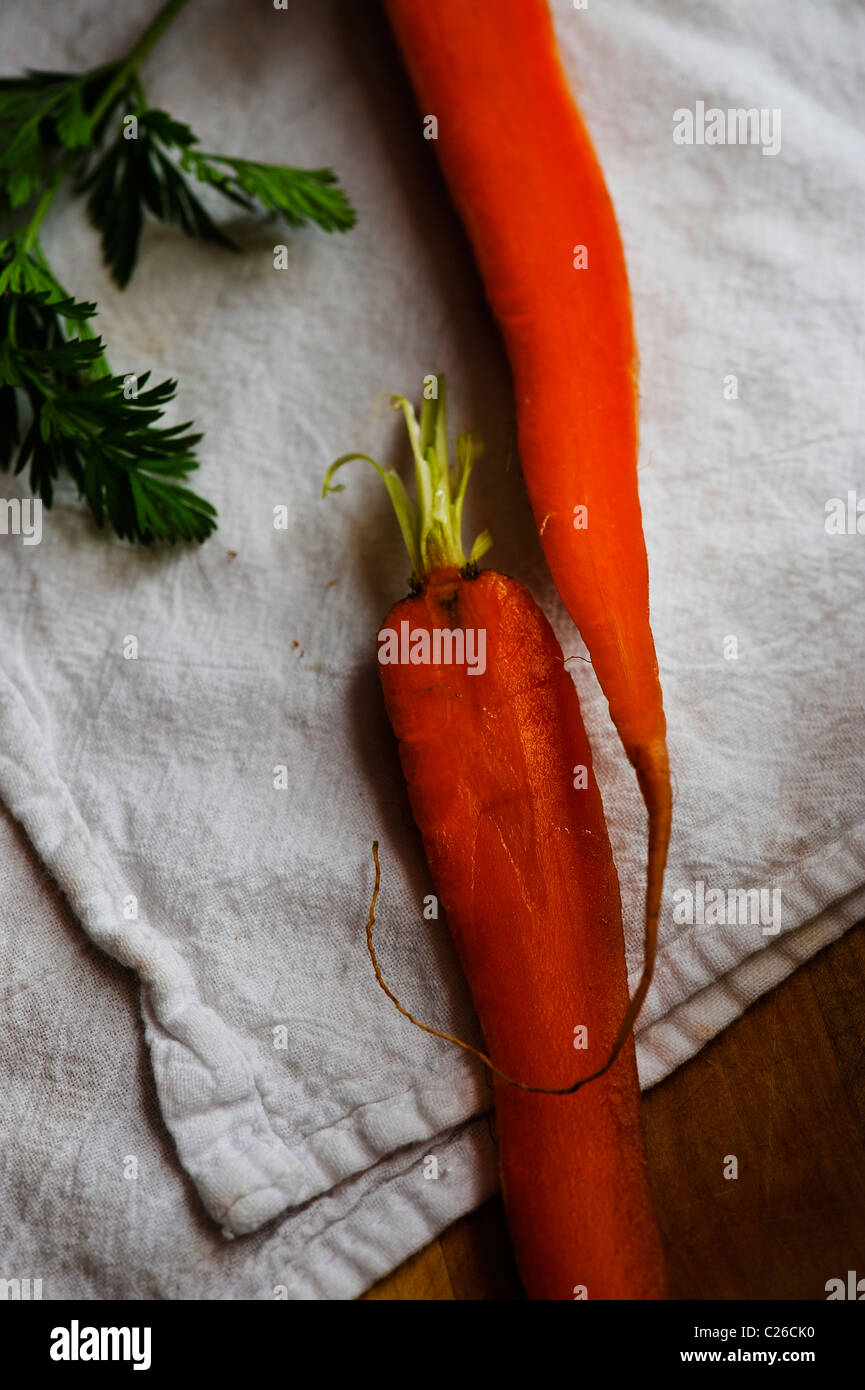 A CARROT SPLIT IN HALF Stock Photo Alamy
