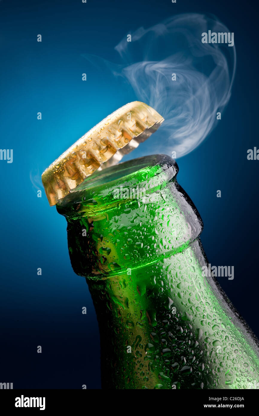 Opening of beer cap with the gas output Stock Photo Alamy