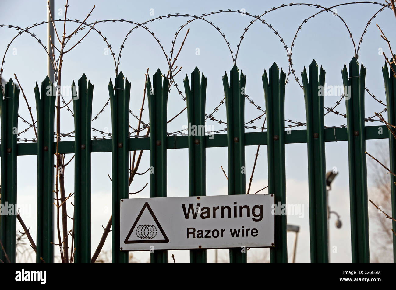 Razor wire fence warning sign hi-res stock photography and images - Alamy
