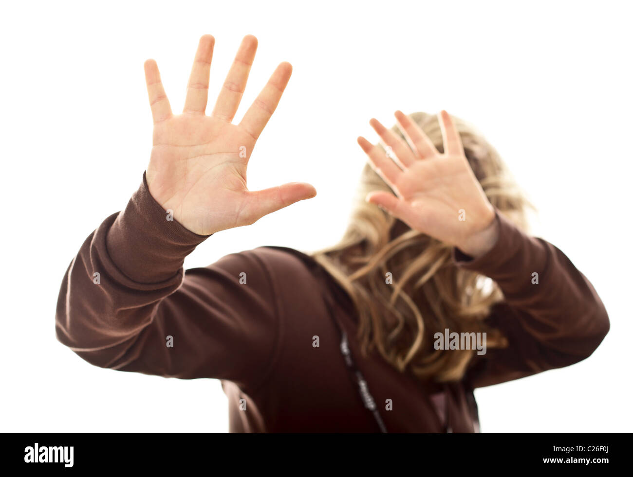 caucasian girl protect herself from violence selective focus Stock Photo