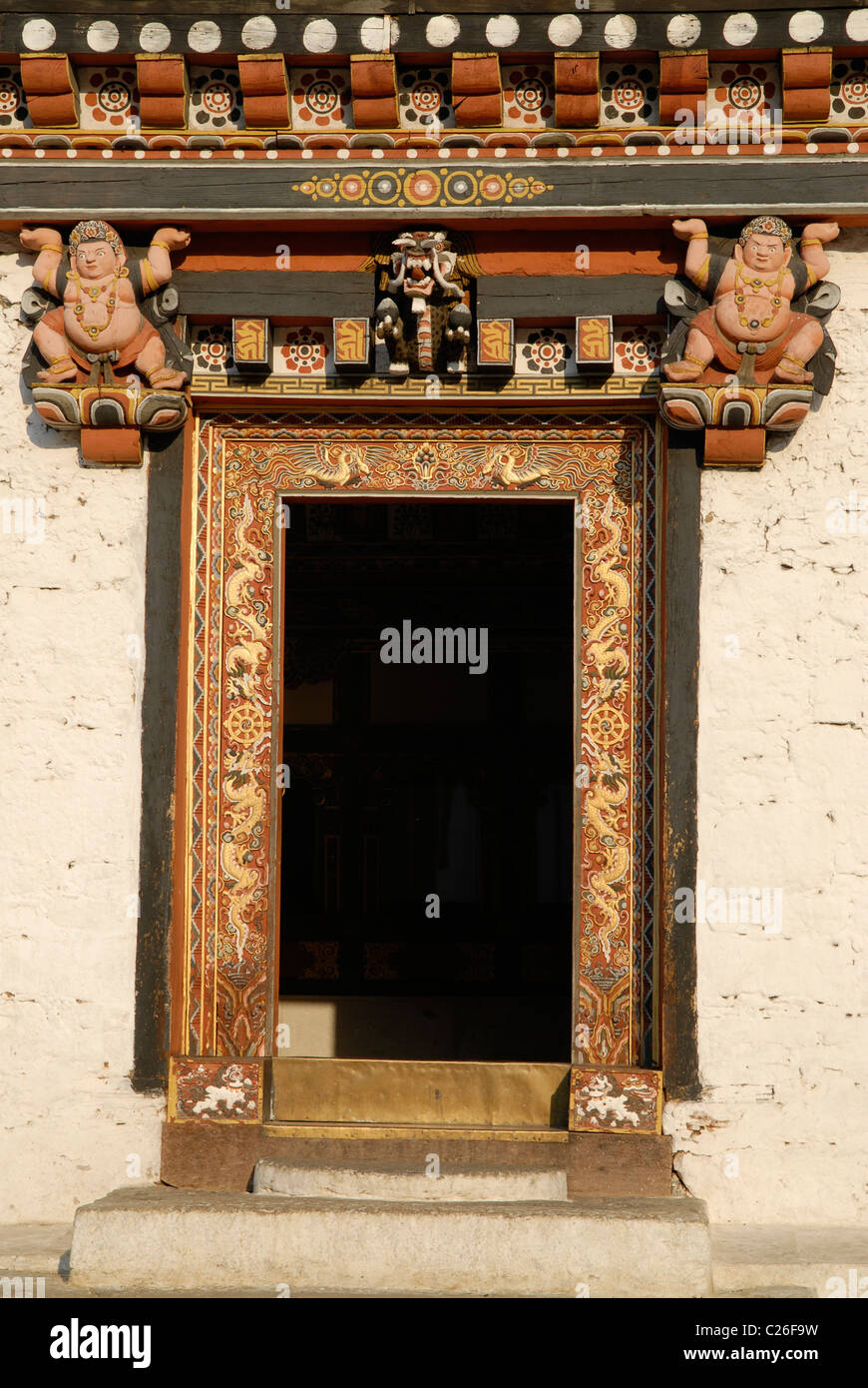 Wood carvings at an entrance to the inner building,Tashichhodzong, Thimphu, Bhutan Stock Photo