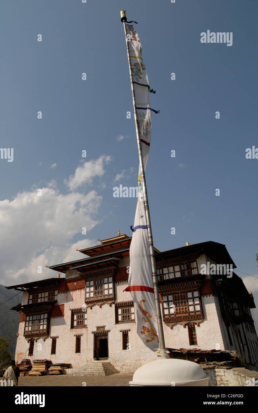 Prayer Flag and Dzong, Trashigang, East Bhutan Stock Photo