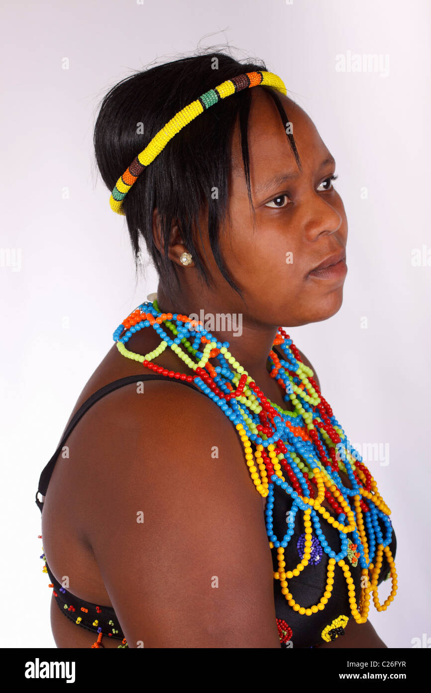 A young woman in traditional ceremonial Zulu dress. South Africa. Isolated. Stock Photo