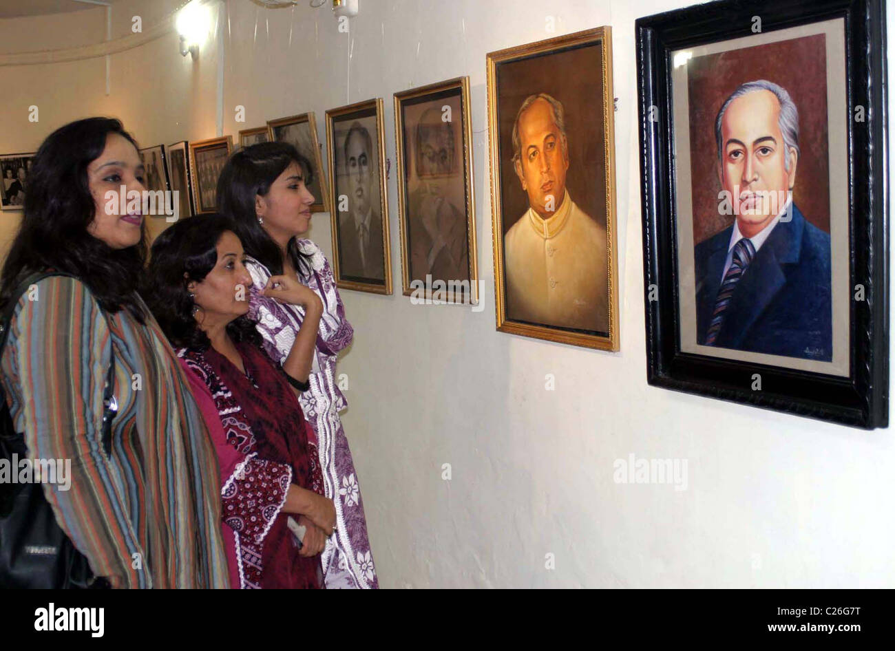 Women take keen interest in pictures of Zulfiqar Ali Bhutto Founder of Peoples Party (PPP) during an exhibition Stock Photo