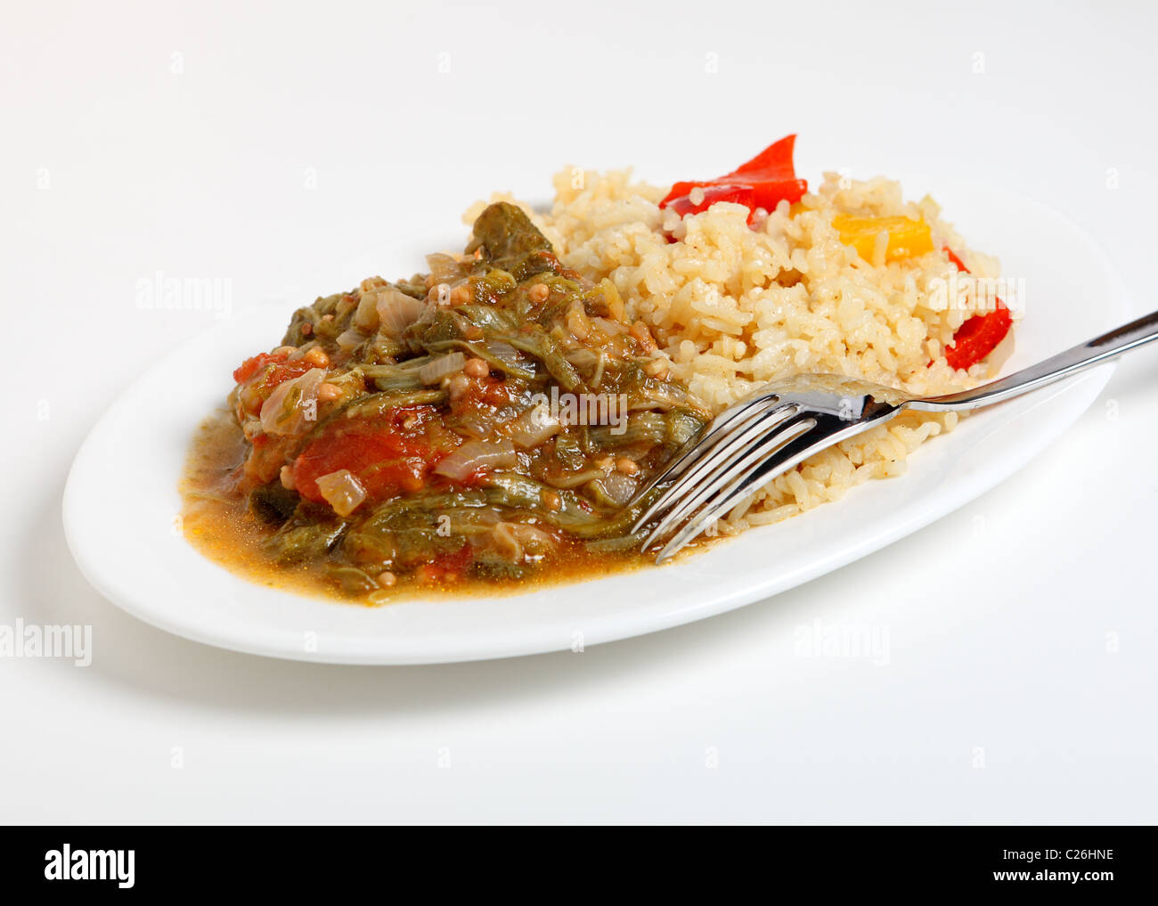 A vegetarian meal of okra stewed with onion and tomato, served with