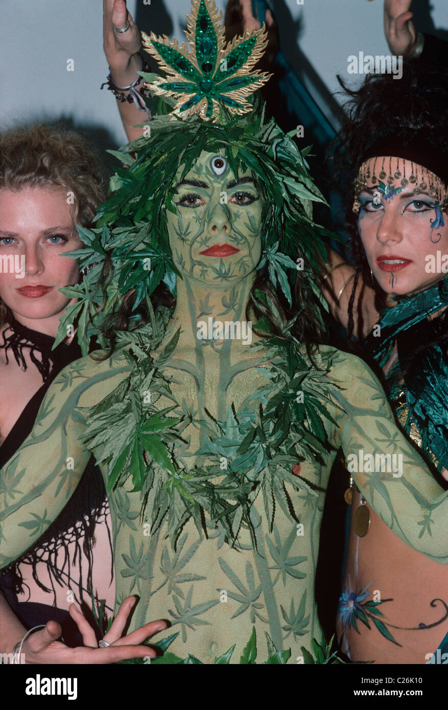 Woman dressed as Marijuana leaf at World Marijuana Championship. Amsterdam - Holland Stock Photo