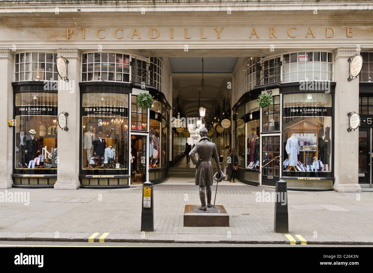 Beau Brummell statue in foreground Entrance Piccadilly Arcade , Jermyn Street, Westminster, London, Uk Stock Photo
