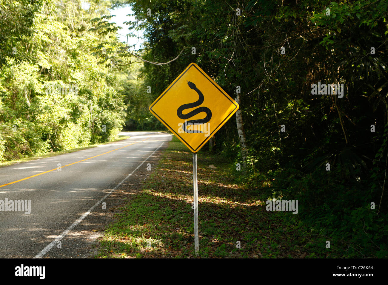Road sign in Guatemala warning against poisonous snakes. Stock Photo
