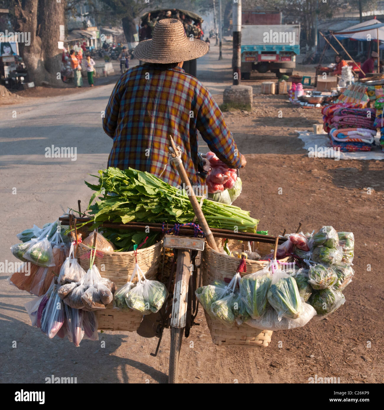 Ambulant grocery on bicycle. Hsipaw. Northern Shan State. Myanmar Stock Photo