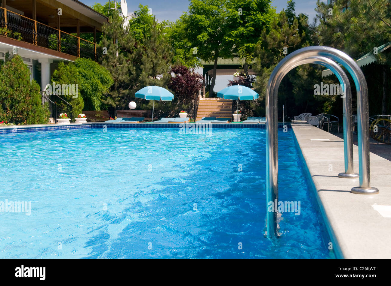 safety rails by a swimming pool Stock Photo - Alamy