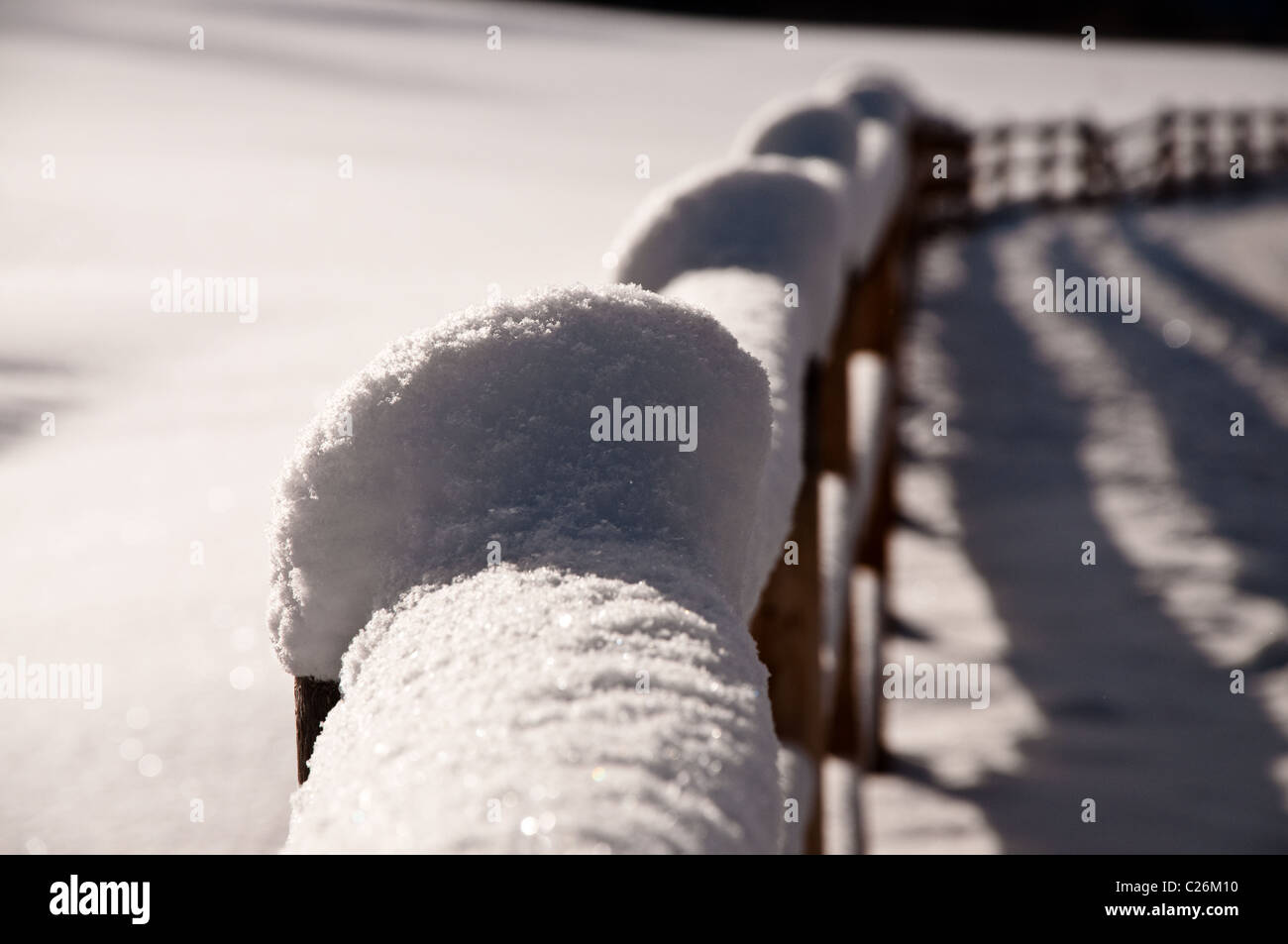 A snow covered wooden fence Stock Photo - Alamy