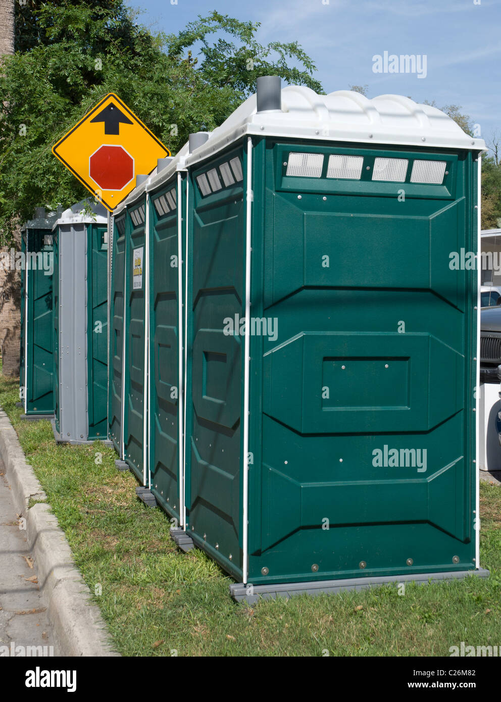 line up of temporary bathroom facilities at Spring Arts Festival
