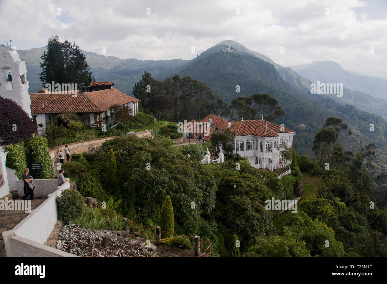 On the hillside above Bogota Colombia is Monserrate, the city's symbol, where two restaurants offer great views and food. Stock Photo