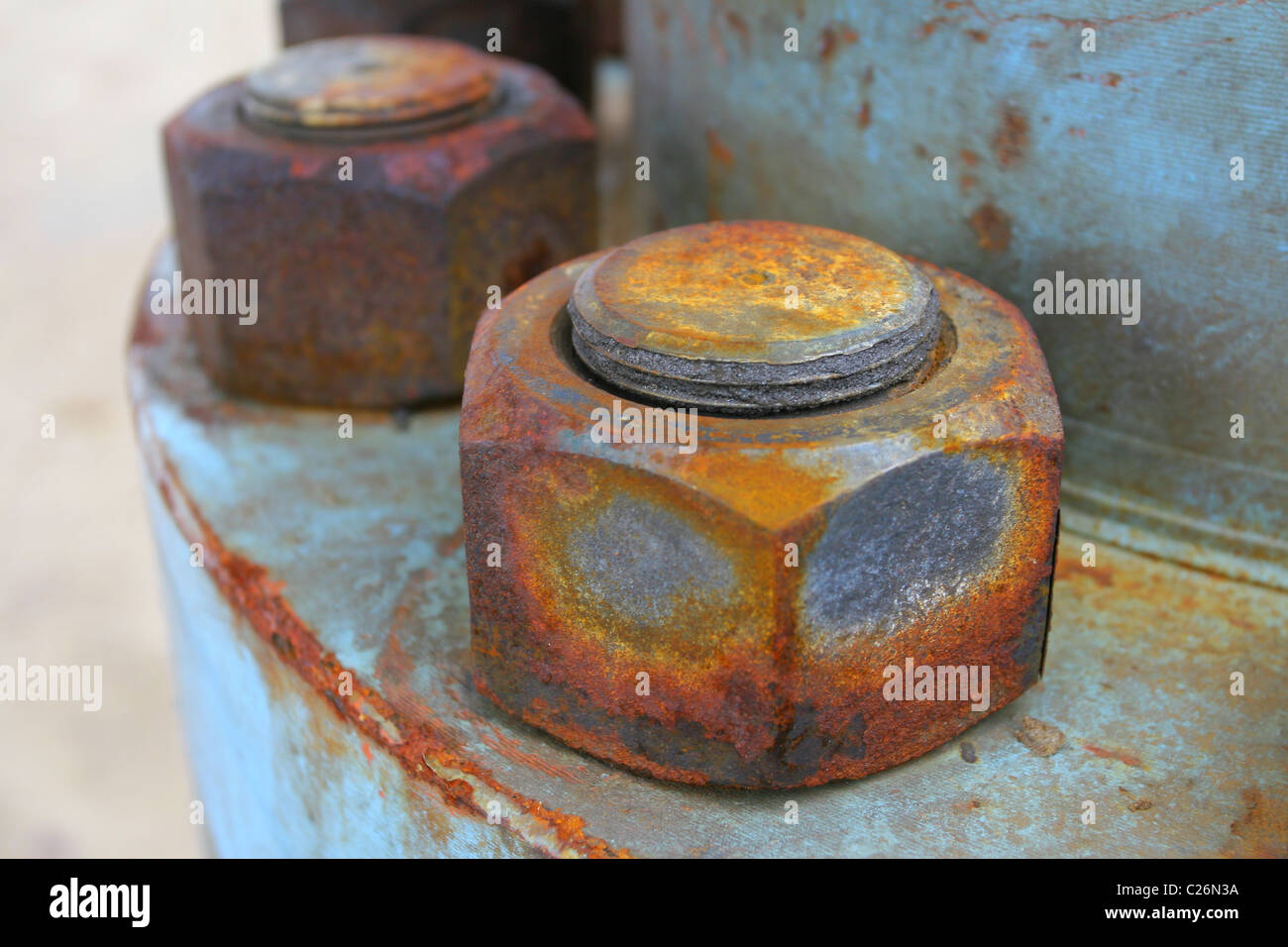 Close up rusted nuts on the casing head. RUSSIA Stock Photo