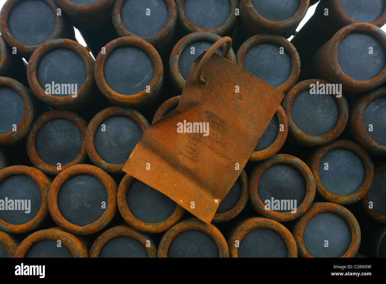 Warehouse of drill pipes with lids on the end. Yamal, RUSSIA Stock Photo