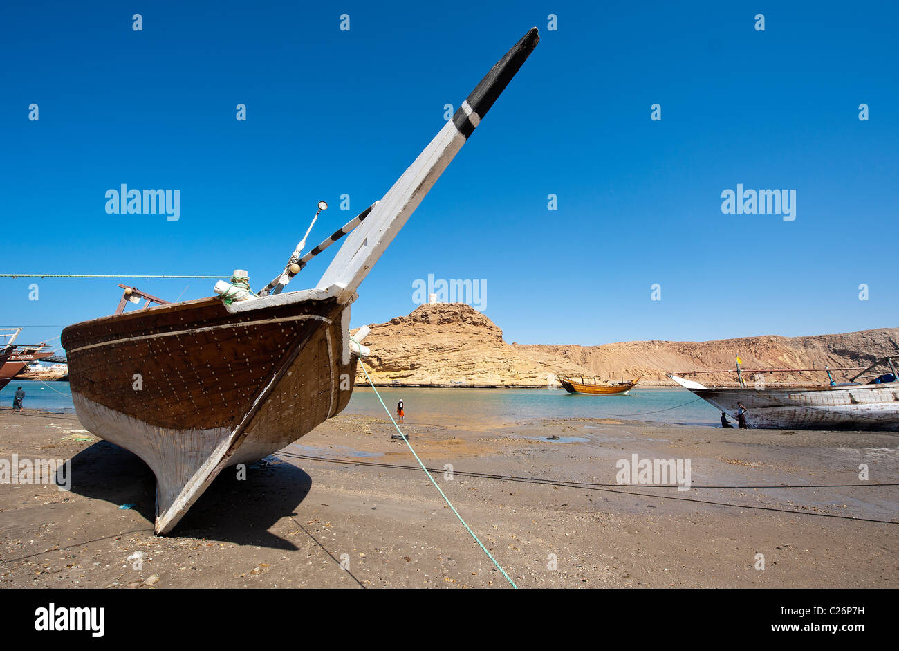 Beached dhow at Al Ayjah, Sur, Oman Stock Photo