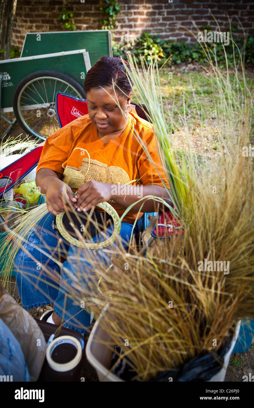 Gullah sweetgrass basket weaver at Boone Hall Plantation in Charleston