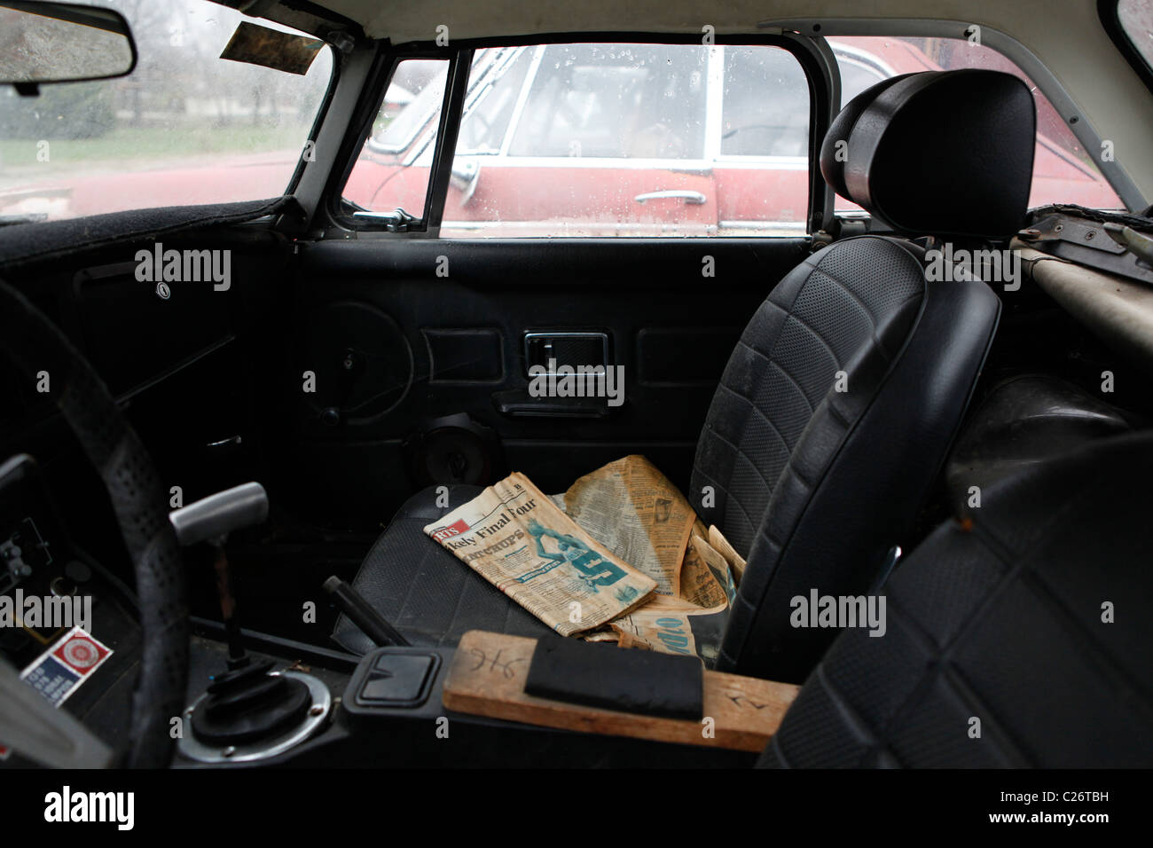 MG British Sportscar sits before auction sale next to a barn in rural Indiana. sports car interior seats Stock Photo