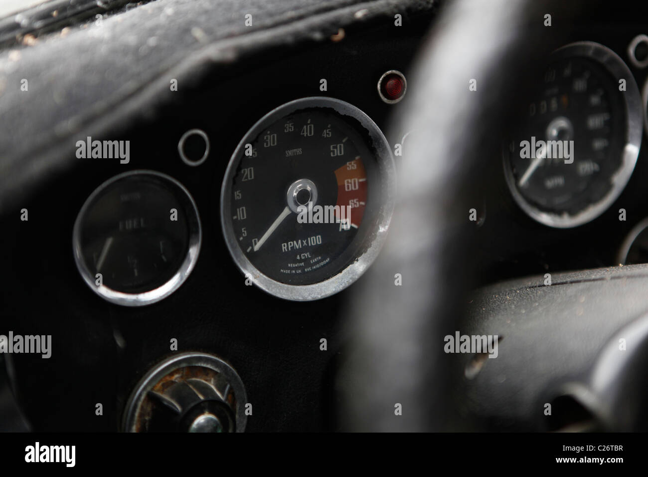 MG British Sportscar sits before auction sale next to a barn in rural Indiana. sports car speedometer detail  Stock Photo