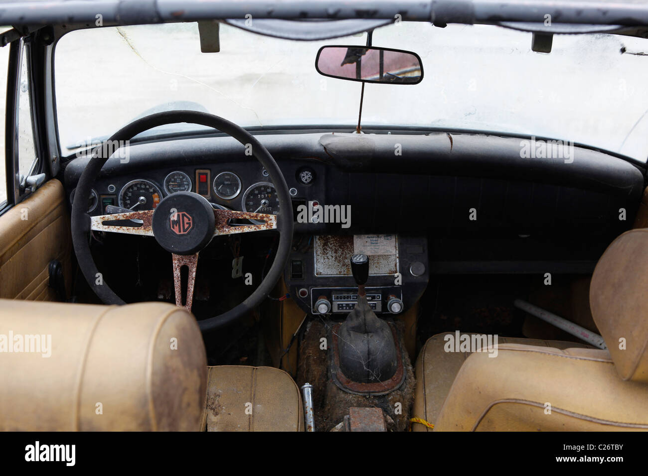 MG British Sportscar sits before auction sale next to a barn in rural Indiana. sports car Special interior Stock Photo