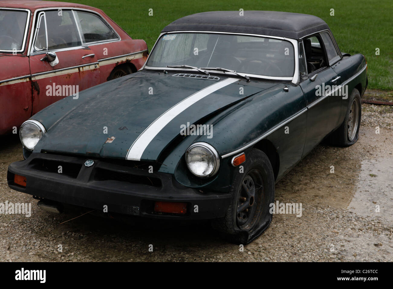MG British Sportscar sits before auction sale next to a barn in rural Indiana. sports car MGB Stock Photo