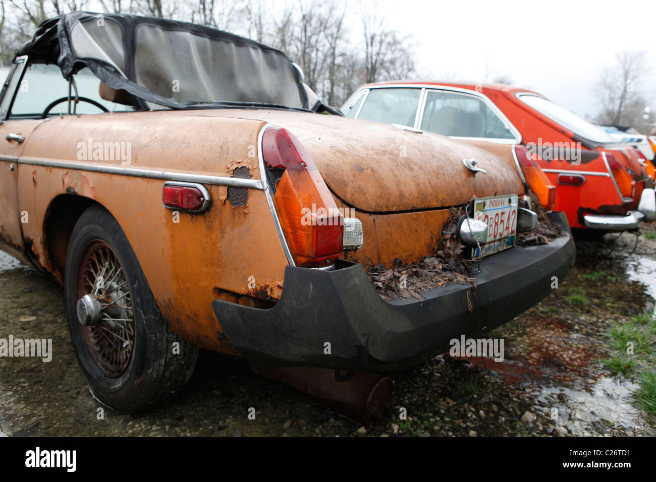MG British Sportscar sits before auction sale next to a barn in rural Indiana. sports car tail light  Stock Photo