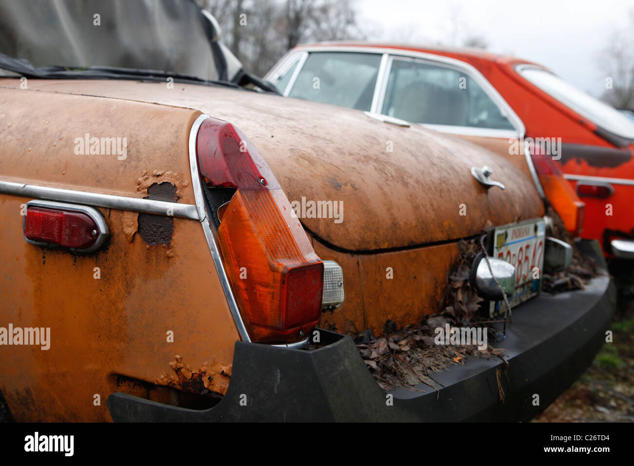 MG British Sportscar sits before auction sale next to a barn in rural Indiana. sports car tail light medium detail  Stock Photo