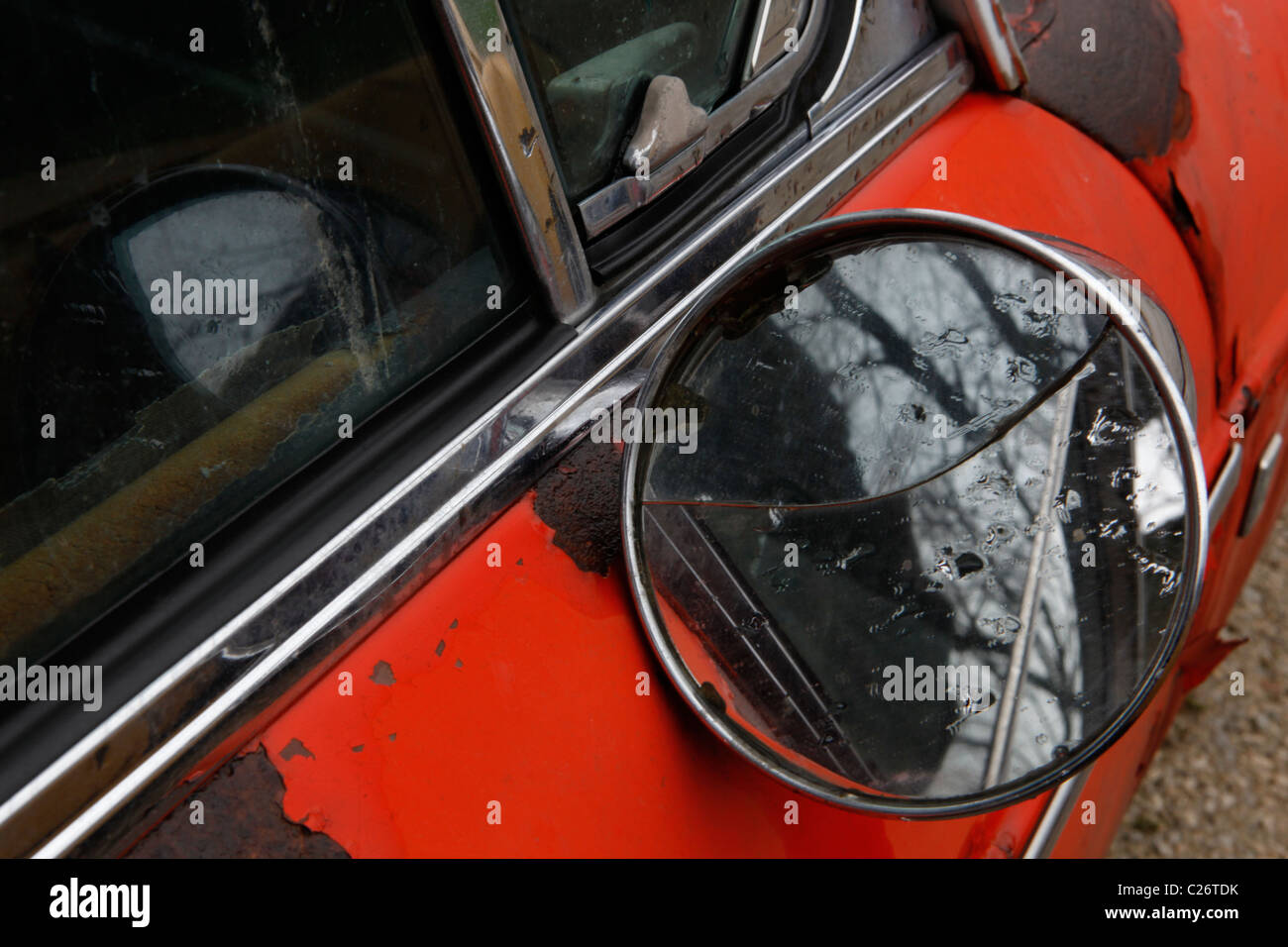 MG British Sportscar sits before auction sale next to a barn in rural Indiana. sports car mirror detail  Stock Photo